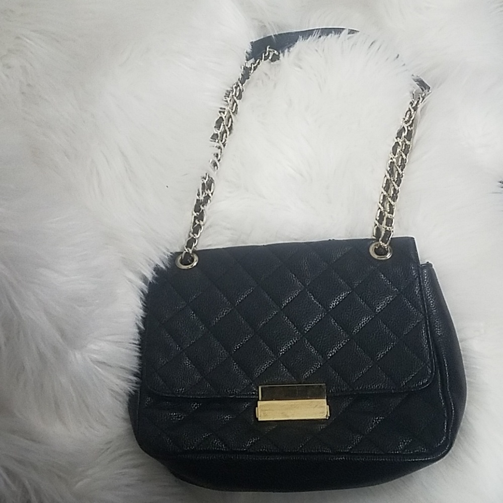 B)  Quilted black purse